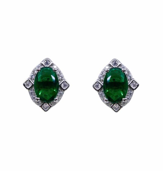 Rhodium plated sterling Silver stud earrings with Clear and Emerald cubic zirconia stones.
