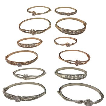 Ladies Assorted design hinged bangle in gold colour rose and rhodium plating with assorted crystal and cubic stones.
