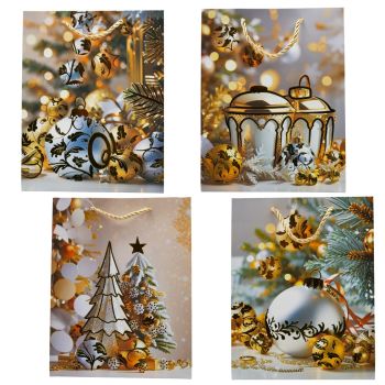 Christmas themed paper gift bags with twisted rope handles.
In 4 assorted designs.
Available in a choice of sizes.
Pack of 12.

Small measures - 18cm x 23cm x 10cm.
Medium measures - 26cm x 32cm x 12cm.
Large measures - 41cm x 32cm x 12cm.