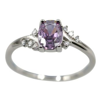 Rhodium plated sterling Silver ring with Clear and Amethyst cubic zirconia stones.