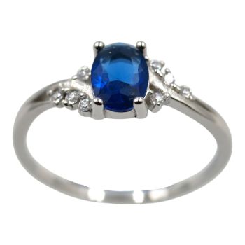 Rhodium plated sterling Silver ring with Clear and Sapphire cubic zirconia stones.