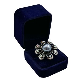 Gunmetal grey colour plated flower design dress ring with genuine crystal stones and a imitation pearl stone.

