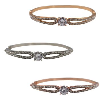 Ladies metal bangle with genuine crystal Clear stones and a centered Clear cubic zirconia stone.
