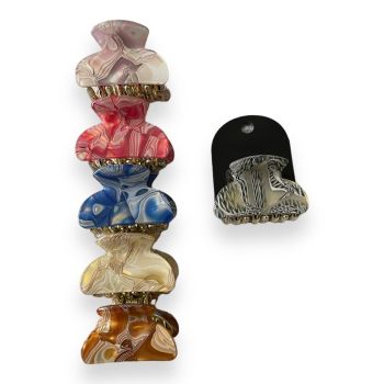 Assorted  gold colour vacum plated mini clamps with a mother of pearl effect in a marble design   .

Available in  6 colours .

Lilac ,Cream ,Brown ,Royal,Pink and silver grey .

Sold as a pack of 12 assorted .

Size approx 4 x 2.5  cm 

Comes w