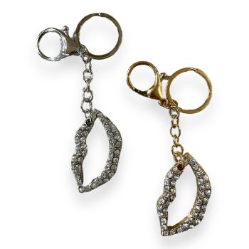 Lips  bag charm  with  genuine crystal stones . Available in Gold colour plating  and Rhodium colour plating .

Sold as a pack of 3 per colour or 4 assorted .

Size approx .Owl 5.5 x 3  cm  ,Total size 11.5 cm .