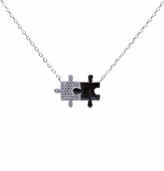 Rhodium plated sterling silver jigsaw puzzle design necklace with Clear cubic zirconia stones.

