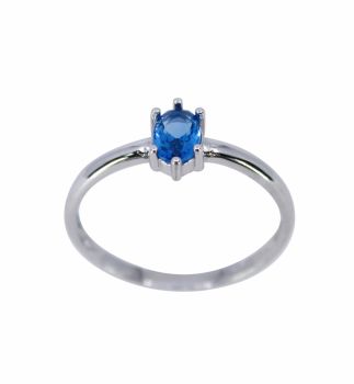 Rhodium plated sterling Silver ring with a Sapphire cubic zirconia stone.