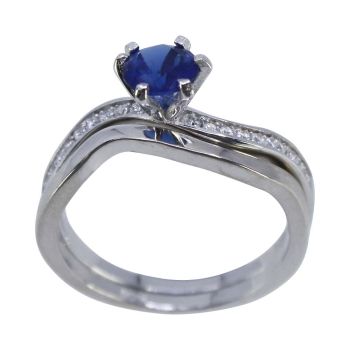 Rhodium plated sterling silver ladies ring set with Clear and Sapphire cubic zirconia stones.
Can be worn together or separately.