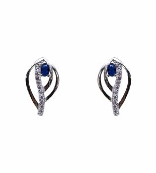 Rhodium plated sterling silver stud earrings with Clear and Sapphire cubic zirconia stones.
