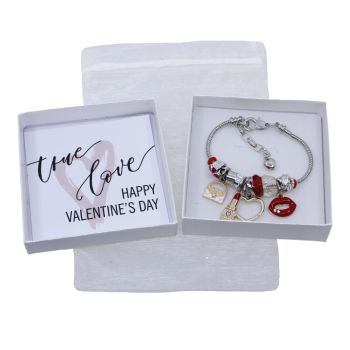 Boxed valentines day charm bracelet gift set.
Set includes a Rhodium colour plated, two tone lipstick, heart and lips design charm bracelet decorated with coloured enamelling.
