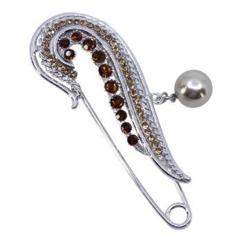 Venetti collection, Rhodium colour plated safety pin brooch with genuine crystal; stones and a imitation pearl.
