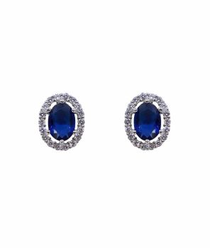 Rhodium plated sterling silver oval stud earrings with Clear and Sapphire cubic zirconia stones.
