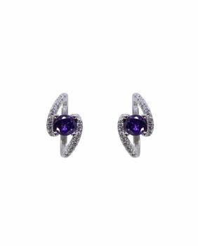 Rhodium plated sterling silver stud earrings with Clear and Amethyst cubic zirconia stones.