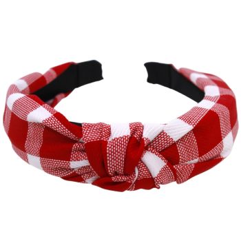 Wide satin covered head band decorated with checked fabric and centred knot.
