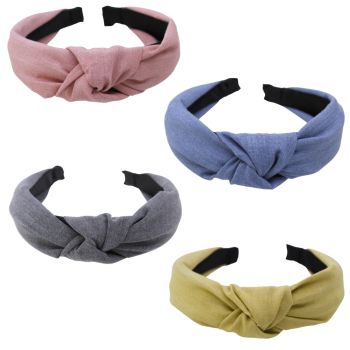 Wide Black Satin alice band covered with a soft cotton feel fabric with a centred knot.
