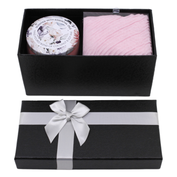 Boxed gift set includes a hand poured blend of coconut and soy wax candle scented with Peony and Litchi, a baby Pink endless pleated scarf perfectly presented in a Black card gift box decorated with a Silver Satin bow.