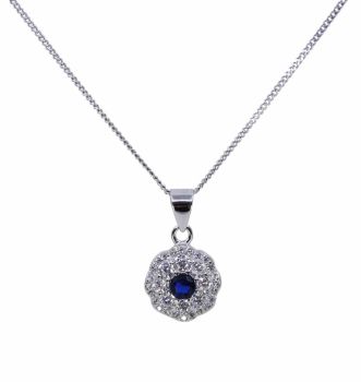 Rhodium plated sterling Silver pendant with Clear and Sapphire cubic zirconia stones.
