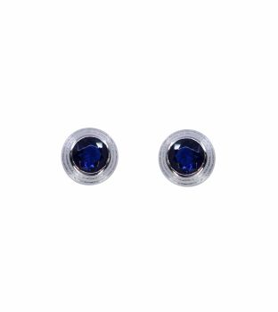 Rhodium plated sterling Silver stud earrings with Sapphire cubic zirconia stones.
