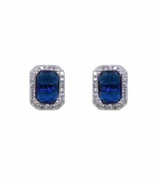 Rhodium plated sterling Silver stud earrings with Clear and Sapphire cubic zirconia stones.