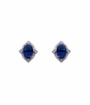 Rhodium plated sterling Silver stud earrings with Clear and Sapphire cubic zirconia stones.
