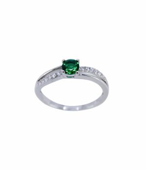 Rhodium plated sterling silver ring with Clear and Emerald cubic zirconia stones.