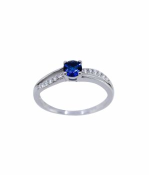 Rhodium plated sterling Silver ring with Clear and Sapphire cubic zirconia stones.