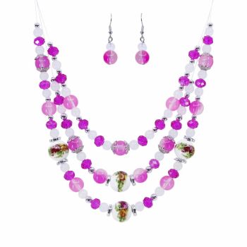 Rhodium colour plated, 3 tier necklace and pierced drop earring set.
Necklace is decorated with acrylic, glass beads, floral print beads and faceted crystal beads.
