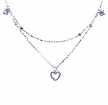 Rhodium plated sterling Silver heart design necklace with Clear cubic zirconia stones.