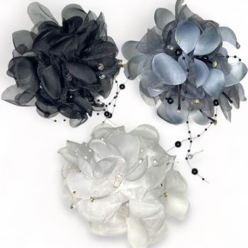 Large size Hair flowers on a concord clip with imitation pearls and ab crystal stones on silky cord .

Can also be worn as a brooch with brooch pin.

Avilable in White, black and Grey  . 

Sold as a pack of 3 per colour or 4 assorted .

size appro