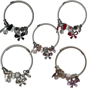 Rhodium Plated ladies adjustable bangle with  a glass butterfly  charm with assorted beads and and charms embelished with genuine crystal stones.

Available in Emerald Black Diamond ,Clear Lilac,  Rose ,and sIam .

One size fits all .

Sold as a pac