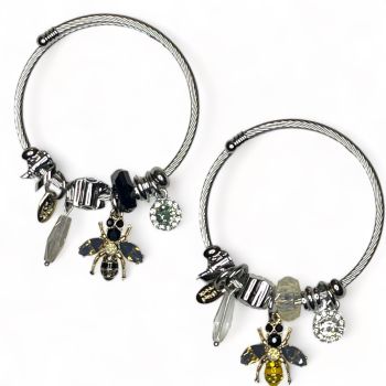 Ladies Rhodium colour plated bangle with assorted charms including an enamel Bee with diamante stones and glass wings,  an enamel flower and crystal daisy  charm .

Available in Black /Yellow or Black /Grey.

Sold as a pack of 3 per colour or 4 assort