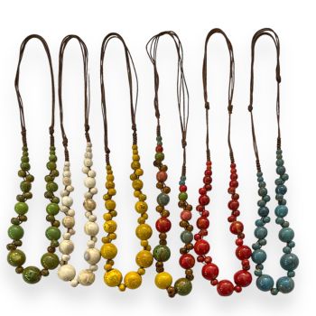 Ladies adjustable ceramic bead cord necklace.

Easy to put on as goes over the head and can slide to desired length . and multi.

Availabe in Olive Green, Rust ,Mustard ,Cream ,Turquoise and Multi .

Sold as a pack of 3 per colour or 6 assorted .
