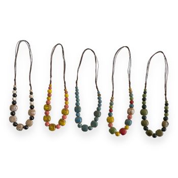 Ladies adjustable ceramic bead necklace .

Comes on a sliding cord so necklace easily goes over the head the can be adjusted to desired length .

Available in Turquoise ,Multicoloured ,Mustard multi ,Brown multi ,and Green multi .

Approx length at 