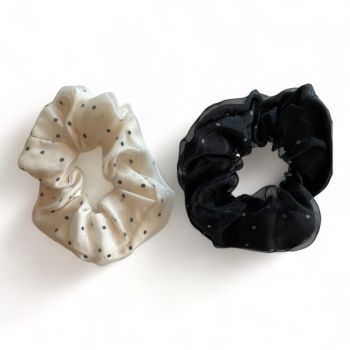 Pretty Organza double layer scrunchies in a Polka dot design.

Available in Black and White .

Sold as a pack of 10 assorted .